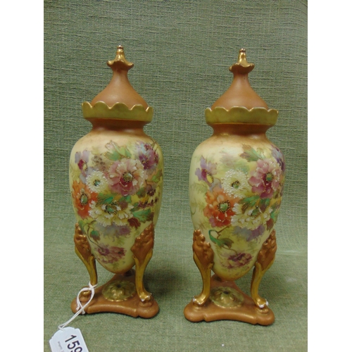 159 - Pair of continental blush ivory lidded vases (restored).