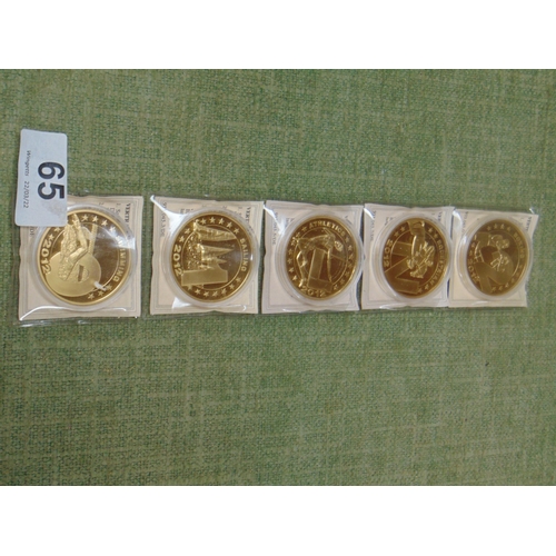 65 - Set of five 2012 gold plated silver coins with certificates.