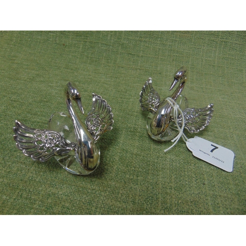 7 - Pair of glass salts modelled as Swans, with white metal mounts and fold-out wings, 2.75