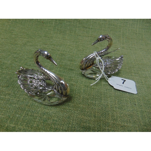 7 - Pair of glass salts modelled as Swans, with white metal mounts and fold-out wings, 2.75