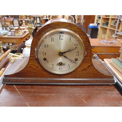 80 - Oak cased dome top mantle clock, 8 day movement chiming on a gong.