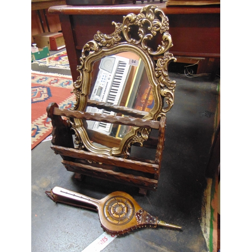 84 - Rustic wooden magazine rack, pair of bellows and an ornate gilt framed wall mirror.