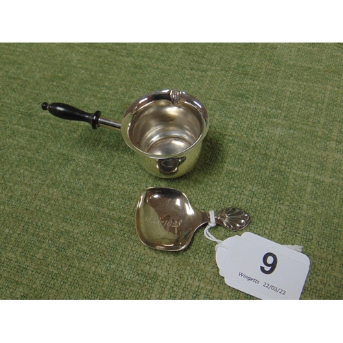 9 - Small George V silver caddy spoon with shell moulded handle, 2.25