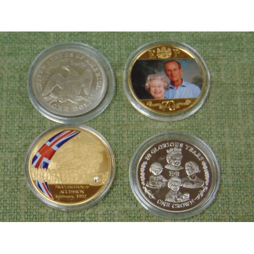 59 - Three proof coins and one other.