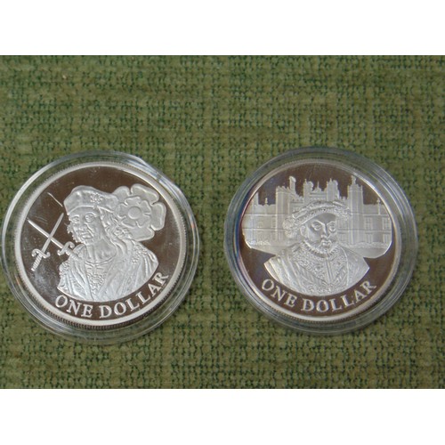 60 - Two silver proof One Dollar coins.