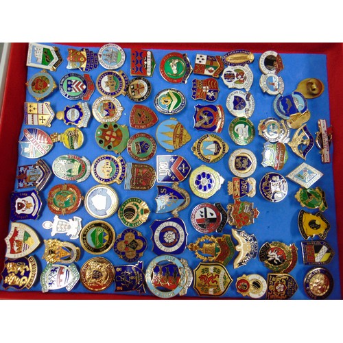 119 - Large collection of enamel badges.