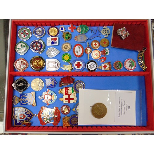 119 - Large collection of enamel badges.