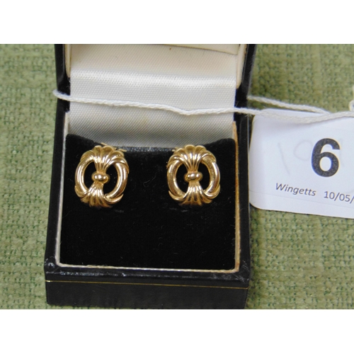 6 - Pair of 9ct Gold clasp earrings, of shaped design. 3.9 gms.