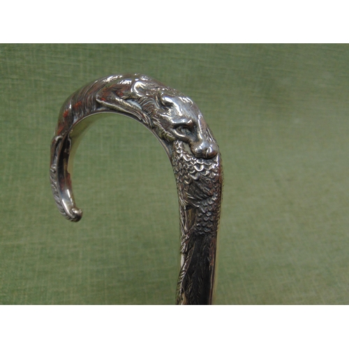 64 - A walking stick, the silver mounted handle modelled as a Fox holding a Pheasant in his mouth.