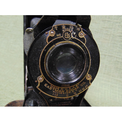 73 - Meccano stationary engine and a cased No.2A folding Autograph Brownie camera. (2).