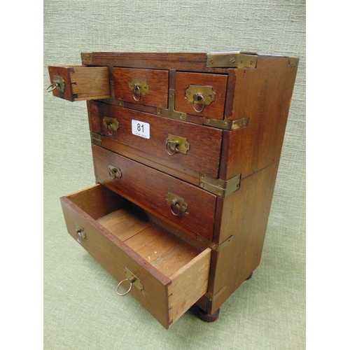 81 - Hardwood table top chest of six drawers with ring handles and metal banding,  14.5 x 11.5 x 6