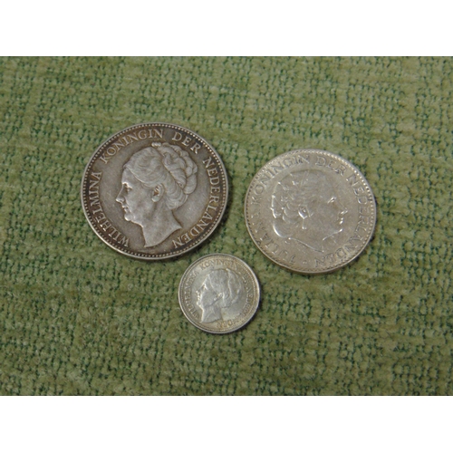 43 - Three Silver Dutch coins, Guilders 1940 and 1957 and 10 Cents, 1934.