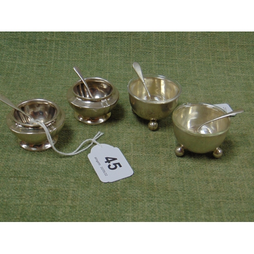 45 - Pair of Silver mustard pots with spoons, together with a pair of continental Silver salts with spoon... 