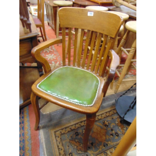 390 - 1920's oak office chair, slatted back, open arms, leather studded seat and on frontal cabriole suppo... 