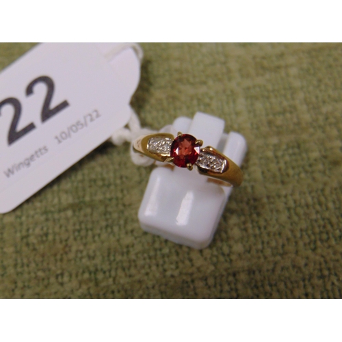 22 - 9ct Gold ring, set with Garnet and diamonds, size M.