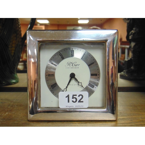 152 - R. Carr, silver cased travel clock.