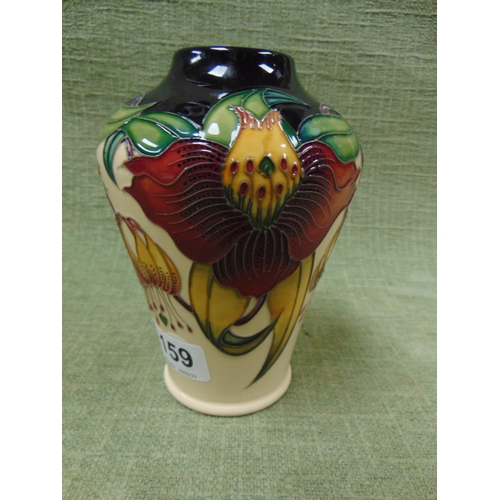 159 - Moorcroft floral decorated vase, 6.5