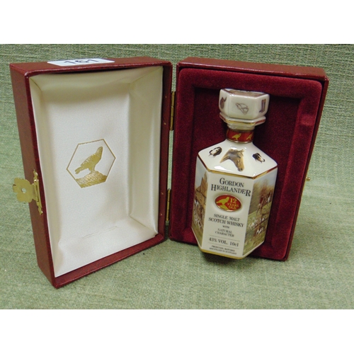 161 - Cased Gordon Highlander 10cl single malt scotch whisky, in presentation pottery decanter.