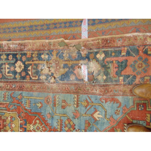 219 - Antique Persian multi coloured carpet, having geometric pattern - for restoration. 133 x 149