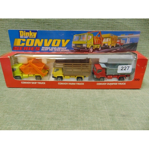 227 - Boxed Dinky Toys convoy skip truck, farm truck and dumper truck. 399.