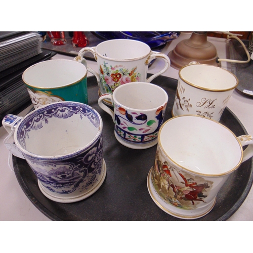 251 - Six antique pottery mugs, having hand painted decoration.