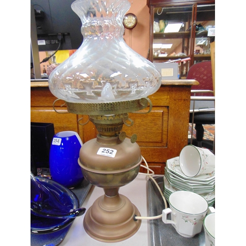 252 - Copper oil lamp, having opaque glass shade, converted.