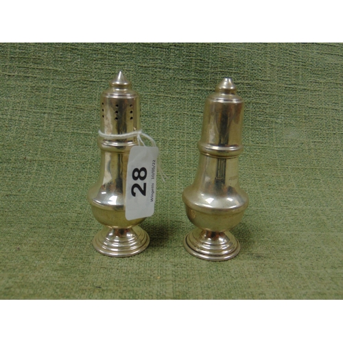 28 - Pair of silver salt and pepper pots, Birmingham 1965. 2.1 onz.