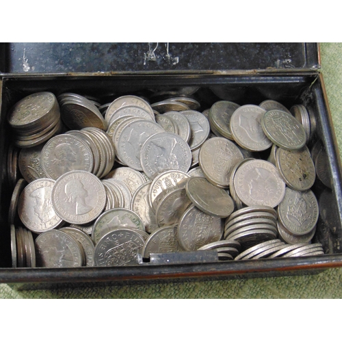 Vintage cash tin, containing a collection of pre decimal shillings.