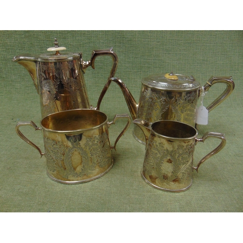 174 - Four piece EPNS tea service of oval form, with engraved decoration.