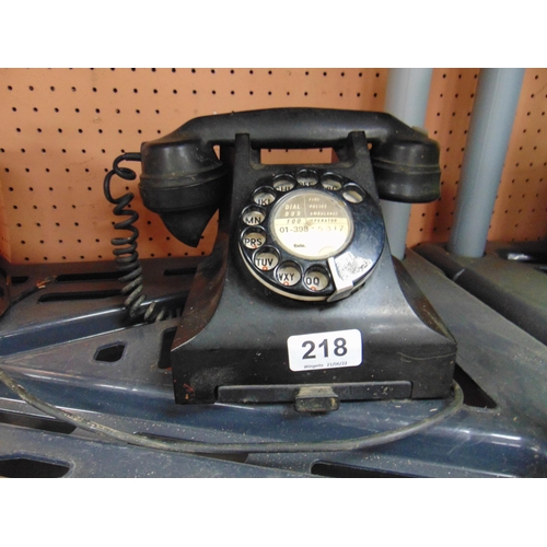 218 - Vintage black bakelite telephone.