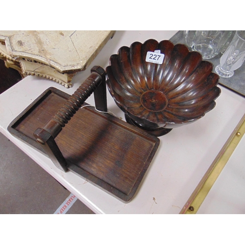 227 - Metal bowl on footed base, together with an oak tray.(2).