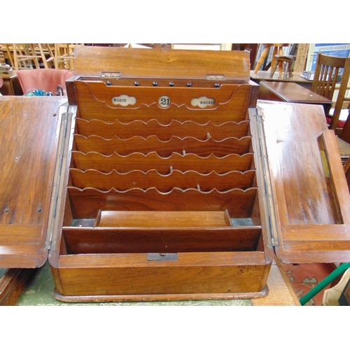 273 - 19th century mahogany table top stationary cabinet, pair of doors revealing an intergrated calendar ... 