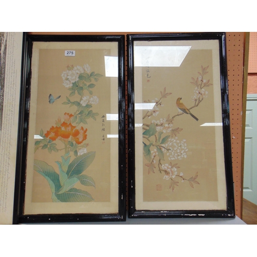 275 - Pair of framed and glazed Oriental prints on silk, each 21 x 10