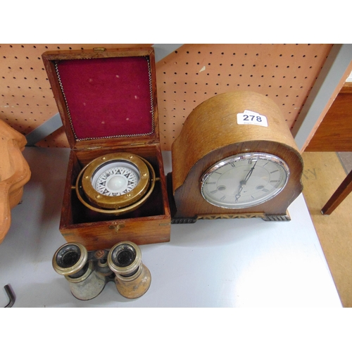 278 - Smiths mantle clock, cased reproduction compass and a pair of binoculars.