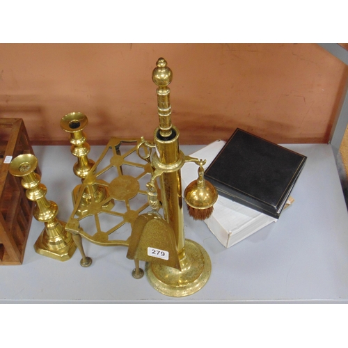 279 - Brass companion set, kettle stand and a pair of candle sticks.