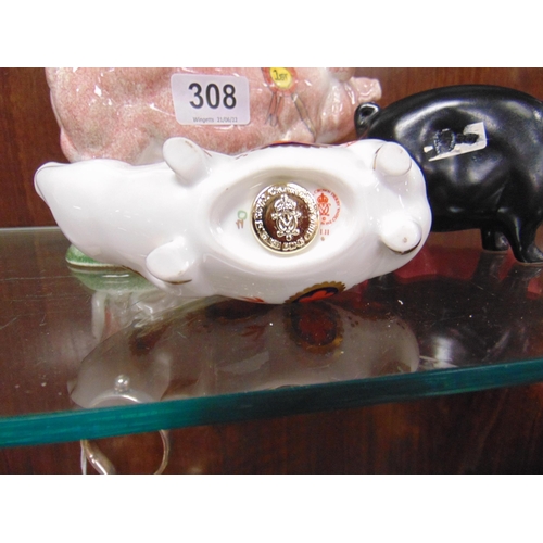 308 - Royal Crown Derby pig paperweight, with three other ceramic pigs.