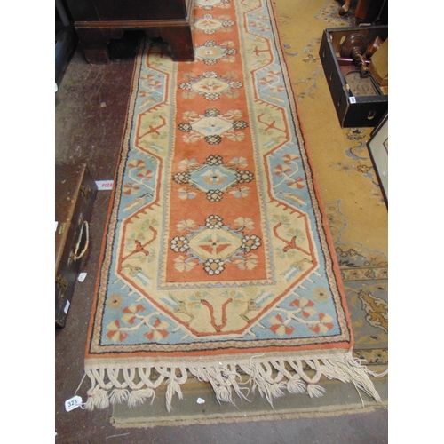 323 - Persian red , yellow and blue colured runner, having geometric pattern, 120 x 32.5