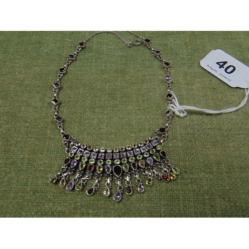 40 - Silver necklace set with various multi coloured stones.