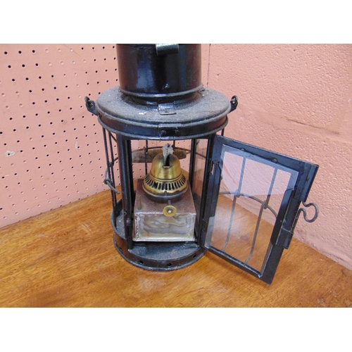 469 - Circular form antique Hurricane oil lamp.