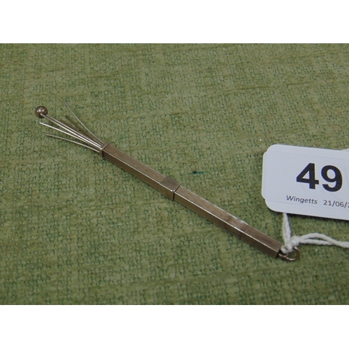 49 - Art Deco white metal swizzle stick.