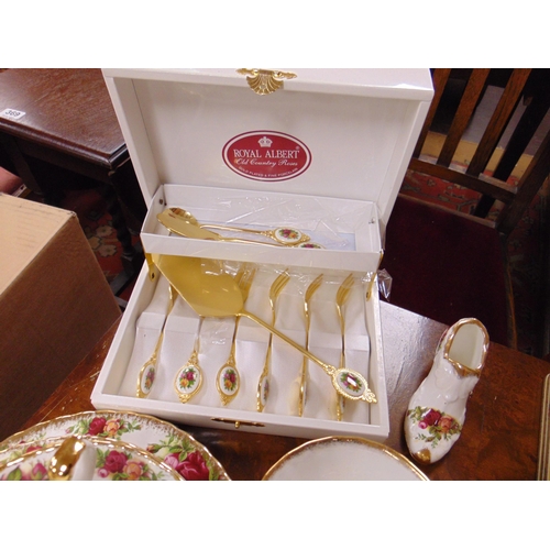 513 - Royal Albert Old Country Rose tea service, with cakestand, boxed cake forks etc.