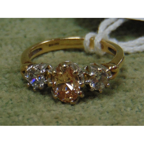 59 - 9ct gold ring set with central oval yellow stone flanked by two clear stones, size N, 3.6g.