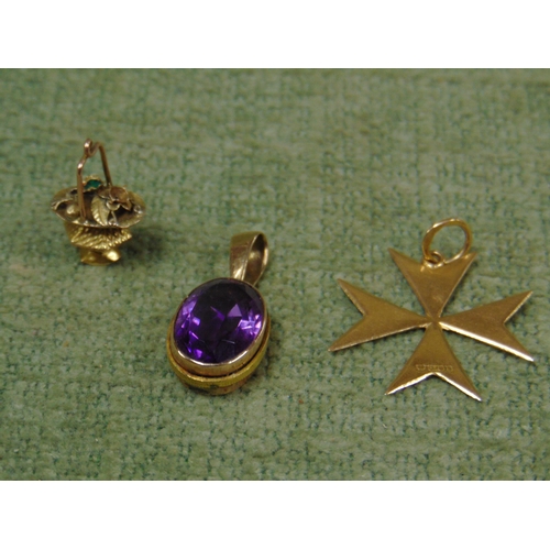 61 - 9ct gold Maltese Cross, sapphire pendant and a basket charm.