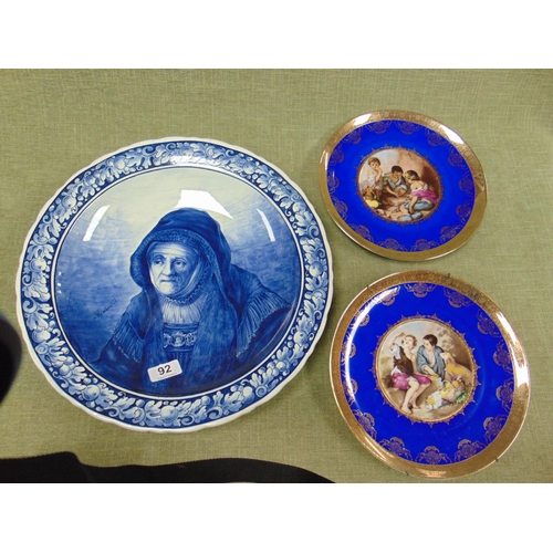 92 - Dutch Delft circular charger, decorated with a portrait of a lady after Rembrandt, 15.5