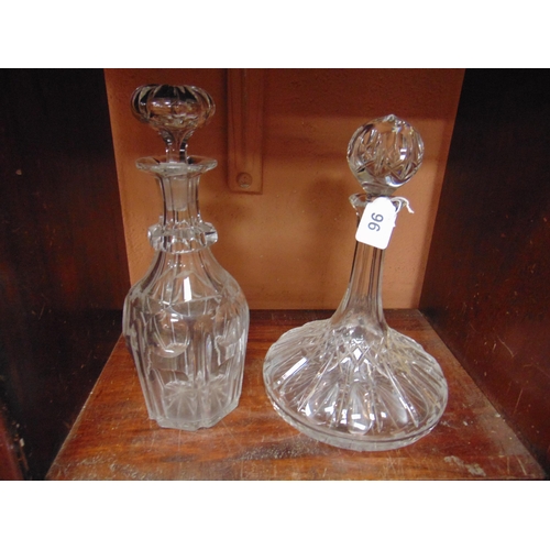 96 - Cut glass ship's decanter and one other.