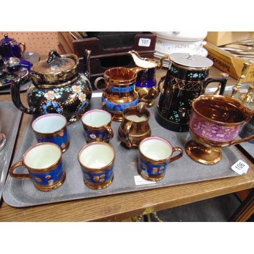 106 - Various antique copper lustre / Jackfield jugs etc,