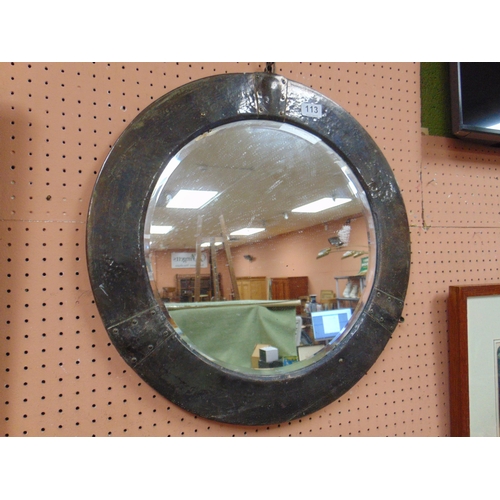 113 - Arts and Crafts circular metal framed wall mirror.