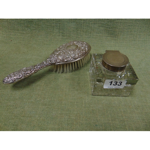 133 - Square glass decanter with hinged silver cover, and a silver backed hairbrush.