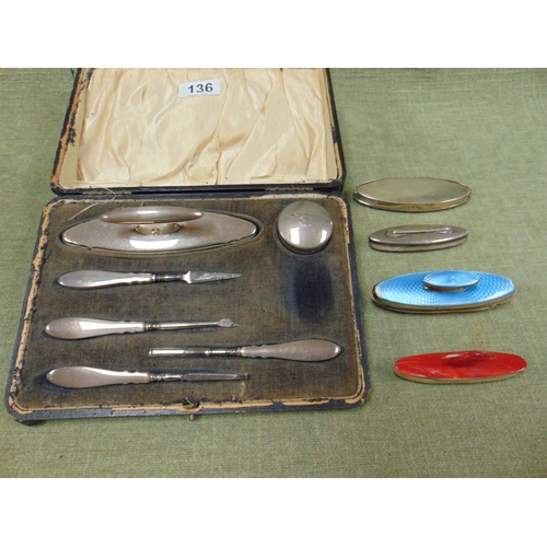 136 - Cased silver mounted manicure set, silver and enamel nail buffer etc.