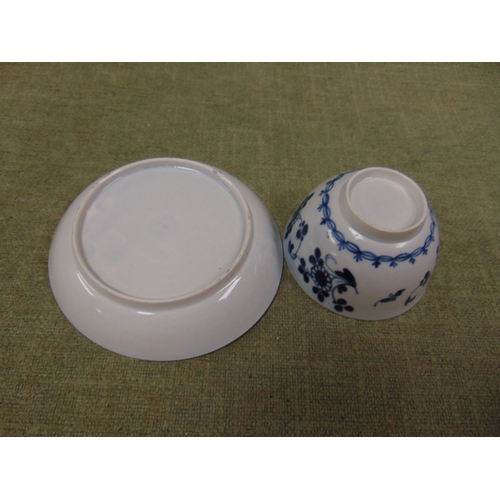 159 - Antique blue and white porcelain tea bowl and saucer.